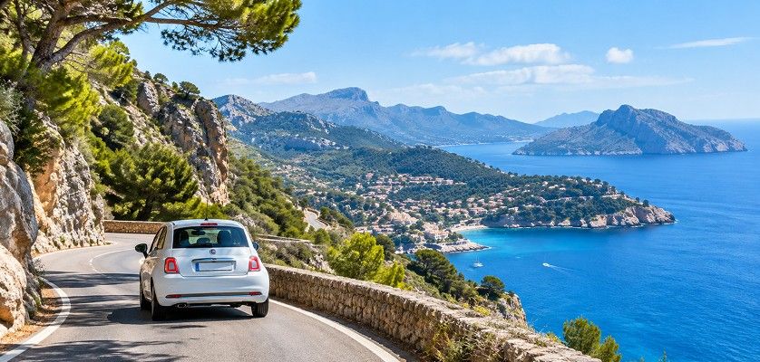 Compact rental car on a scenic Mallorca mountain road